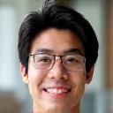 Portrait of Hiroki Tanaka smiling.